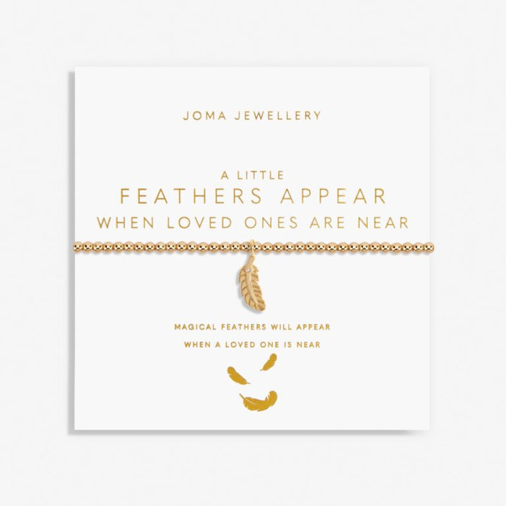 Gold Joma Jewellery "A Little Feathers Appear" bracelet with delicate feather charms on a fine chain.