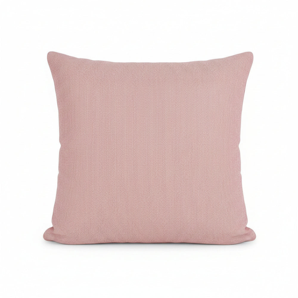 Red striped IB Laursen Christmas cushion with festive pattern, displayed on a cozy sofa for holiday decor.