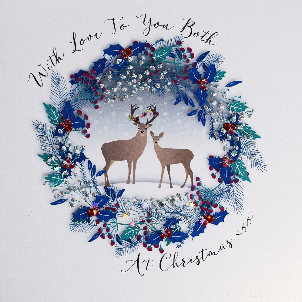 Christmas card featuring reindeer illustrations by Wendy Jones-Blackett for To You Both, by Cornucopia Home and Gift.