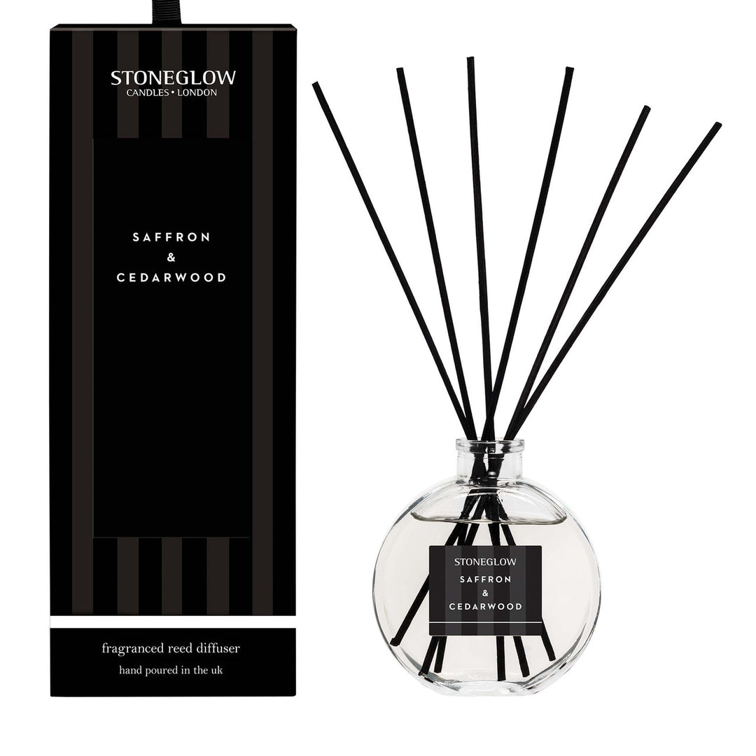 Stoneglow Modern Classics Saffron and Cedarwood Reed Diffuser in 120ml bottle with decorative box, showcasing elegant design.