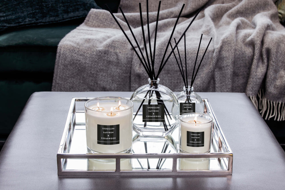 Stoneglow Modern Classics Saffron and Cedarwood reed diffuser in a 120ml glass bottle with reeds, elegant and luxurious design.