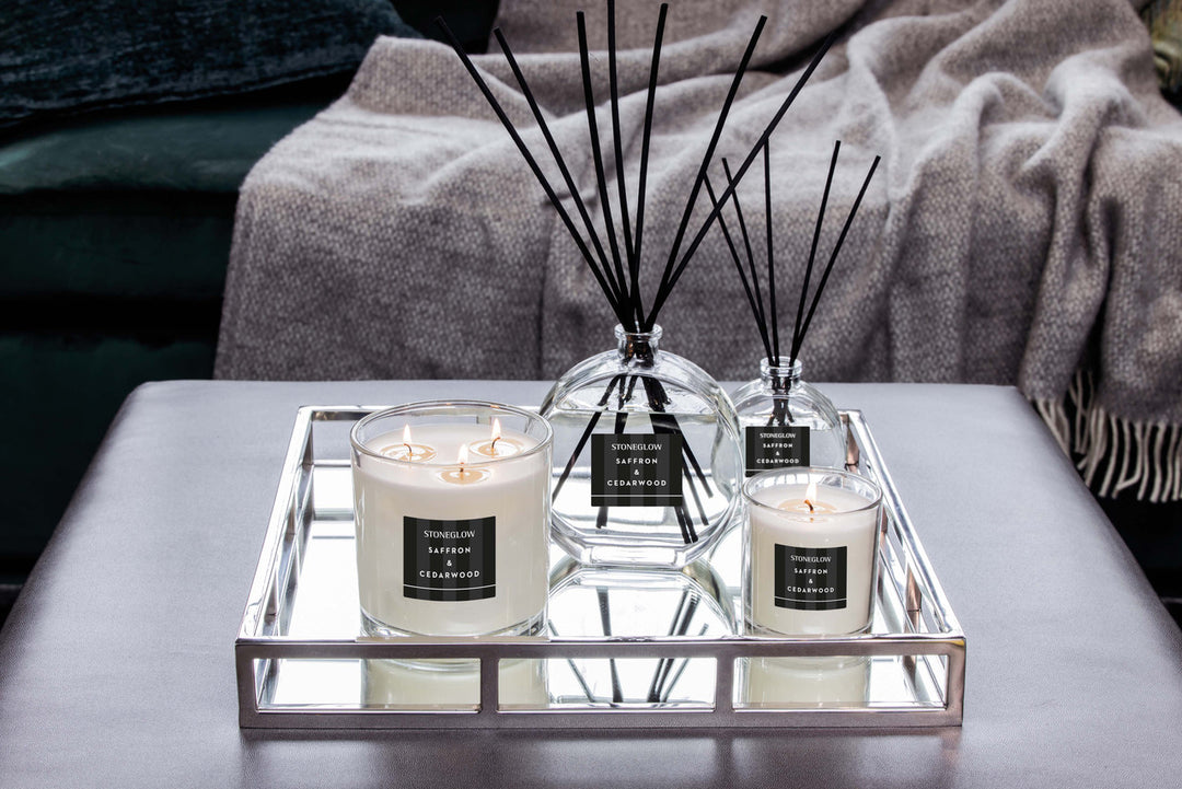 Stoneglow Modern Classics Saffron and Cedarwood reed diffuser in a 120ml glass bottle with reeds, elegant and luxurious design.