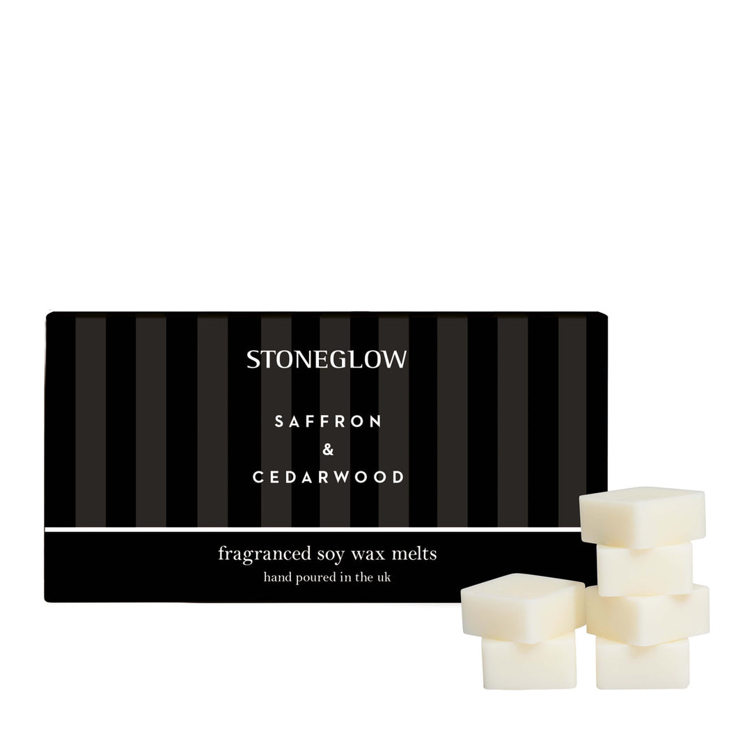 Stoneglow Modern Classics soy wax melts in saffron and cedarwood scent, featuring a sleek stone-style design.