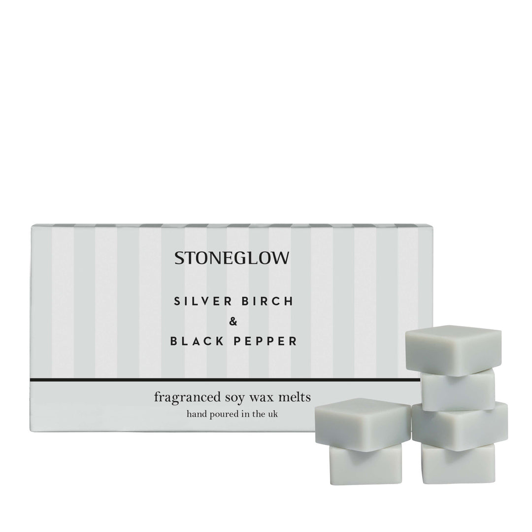 Stoneglow Classic Silver Birch and Black Pepper wax melts in a decorative packaging, showcasing the product's textured design.