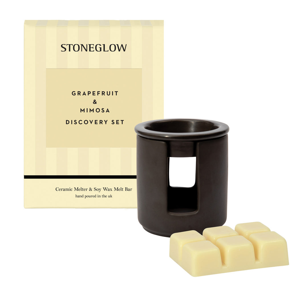 Stoneglow Grapefruit and Mimosa wax melter set with a decorative stone design and matching wax melt bar for home fragrance.