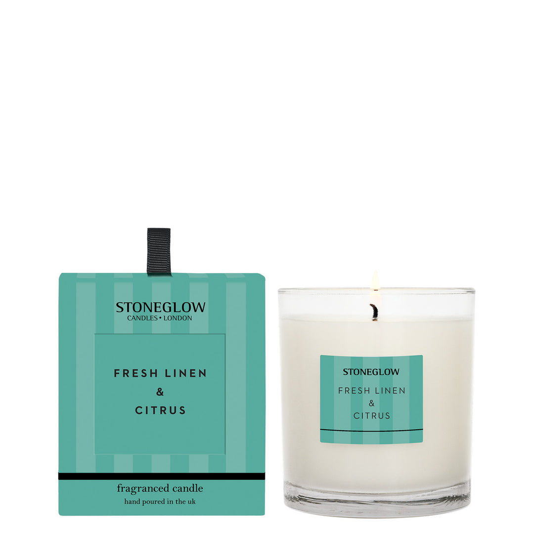 Stoneglow Modern Classics Fresh Linen and Citrus Tumbler Candle with a sleek glass container and fresh scent.