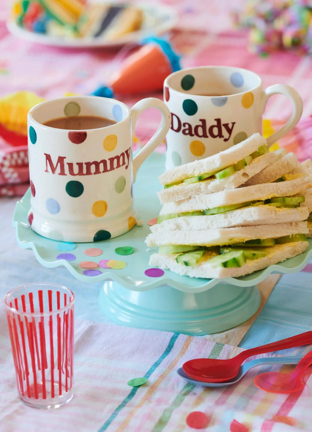 Emma Bridgewater Polka Dot Daddy 1/2 Pint Mug with black and white polka dot pattern, ceramic drinking mug, side view.