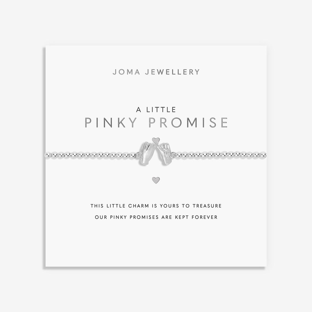 Pink Joma Jewellery A Little Pinky Promise bracelet with delicate charm, displayed on a soft background.