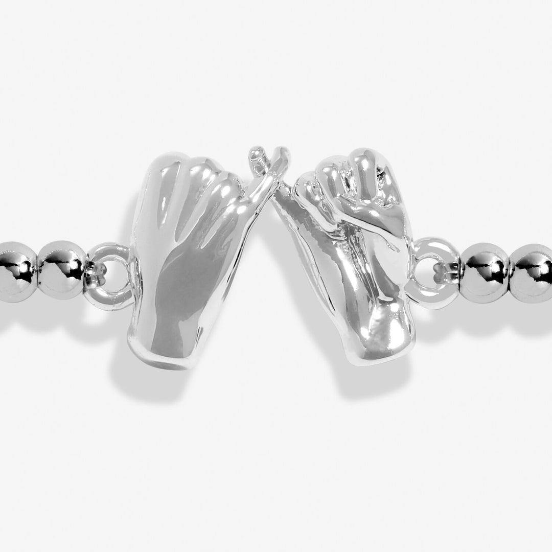 Silver Little Pinky Promise Bracelet by Joma Jewellery featuring a delicate charm and adjustable chain.