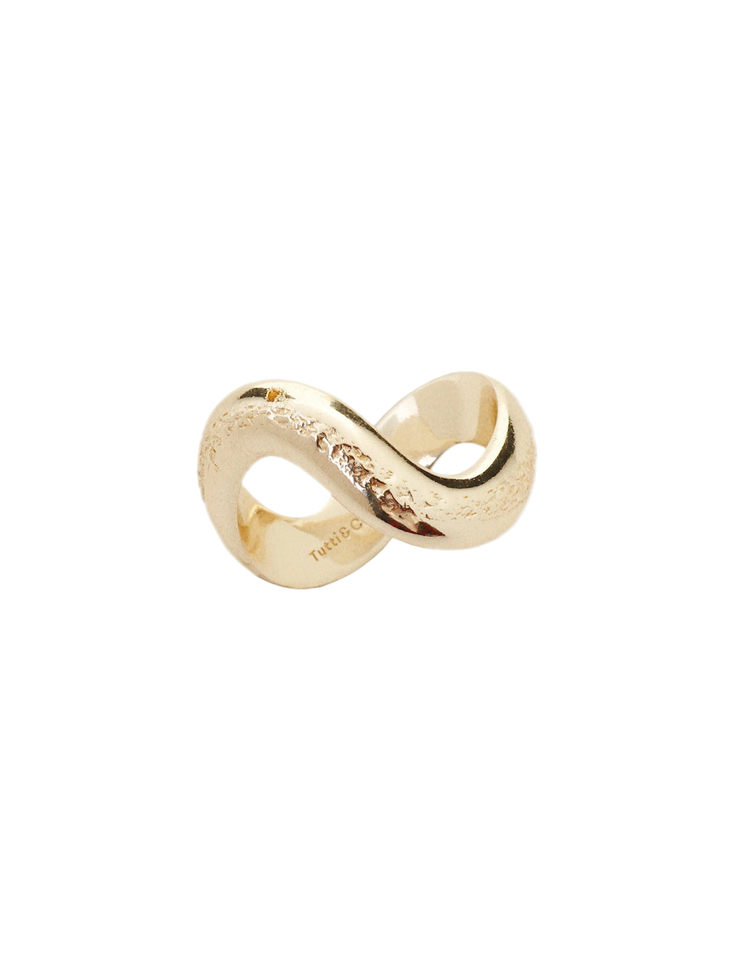 Gold Shadow Ring by Tutti & Co featuring a sleek, modern design with a shiny gold finish.