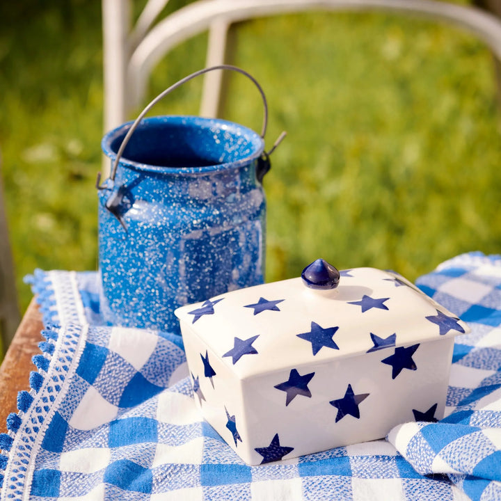 Emma Bridgewater Blue Star small butter dish with a blue star pattern and ceramic finish on a white background