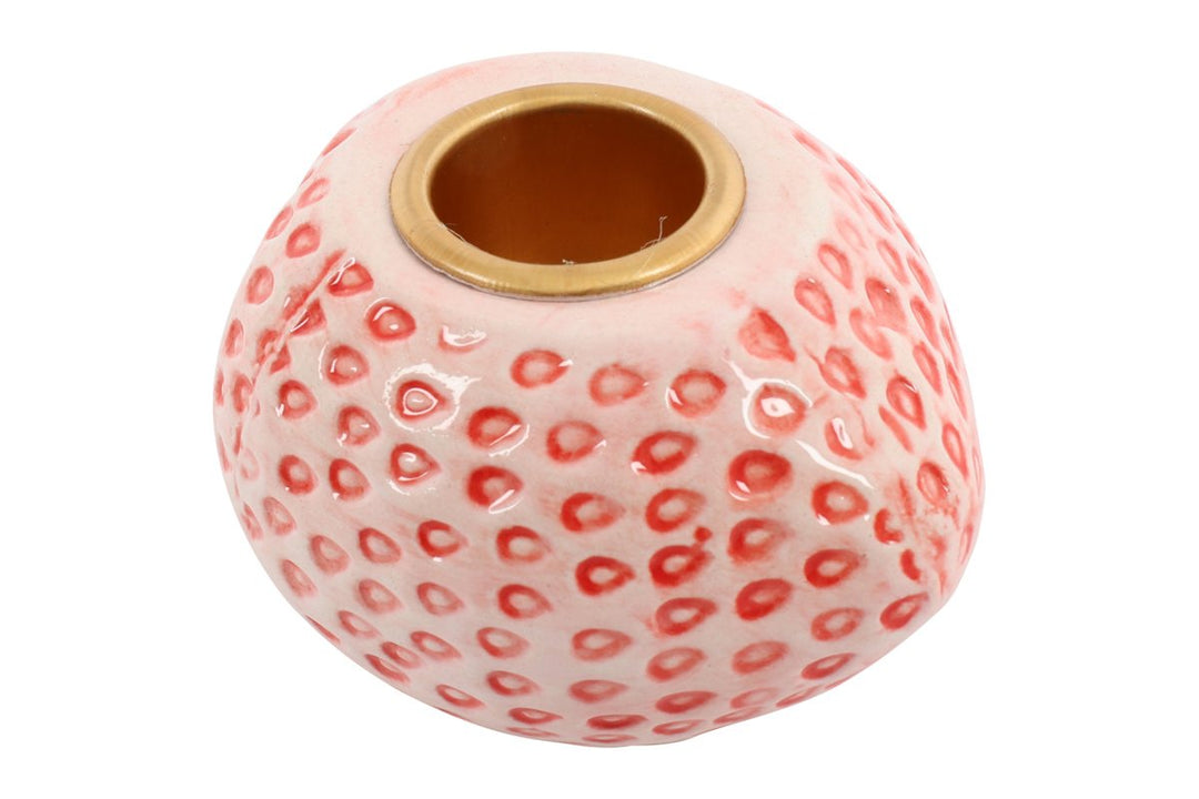 Pink strawberry-shaped candle holder from Cornucopia Home and Gift, featuring a charming design perfect for decorative use.
