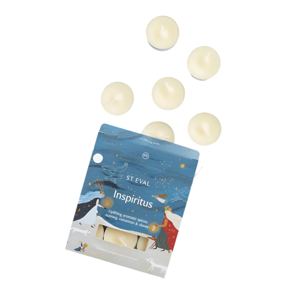 Set of 8 St Eval Inspiritus scented tealights in clear holders, perfect for creating a warm, aromatic glow.