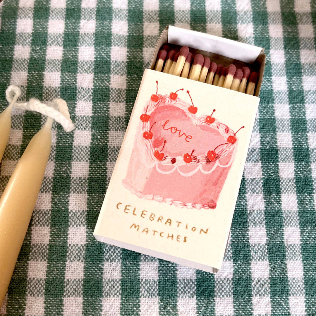Love Heart Cake Matches by Laura Skilbeck, featuring decorative heart-shaped matchsticks for cake and dessert decoration.
