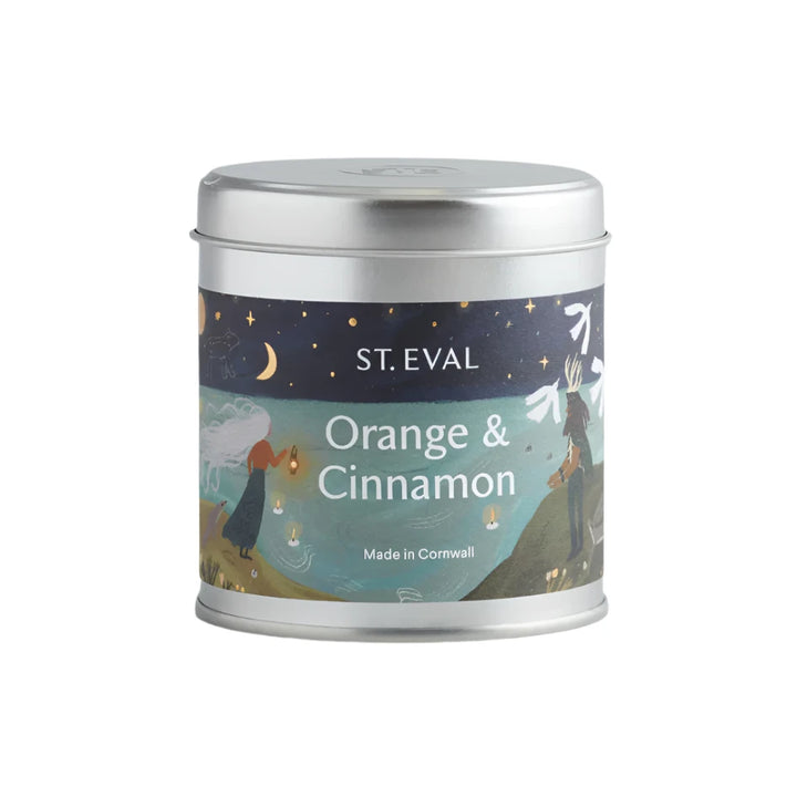 St Eval Christmas orange and cinnamon tin candle with festive orange and cinnamon scent in a decorative metal container.