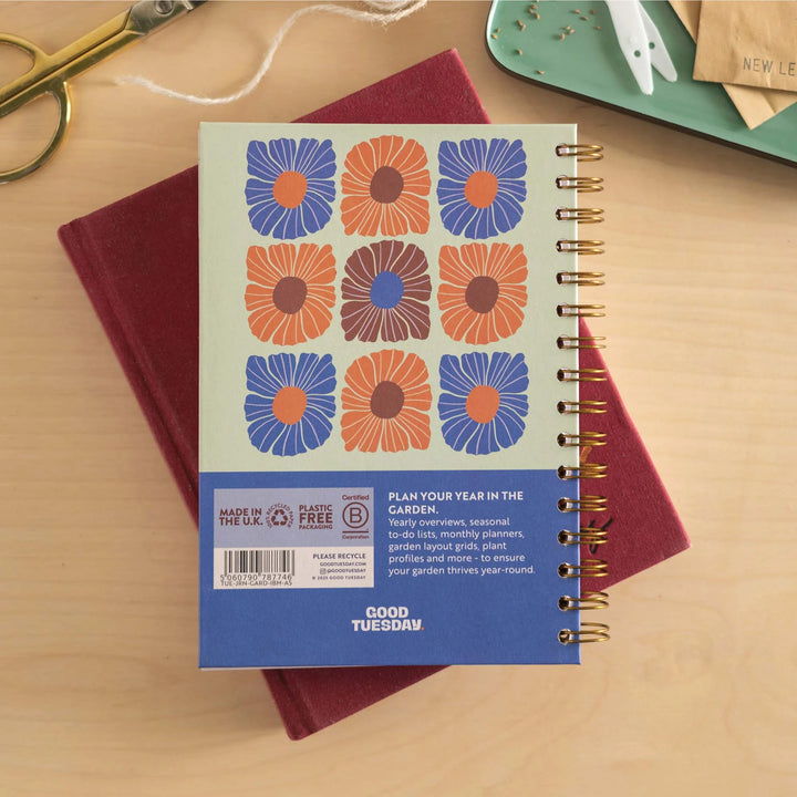 A5 Gardening Hardcover Journal by Good Tuesday, featuring a floral garden cover with detailed bloom illustrations.