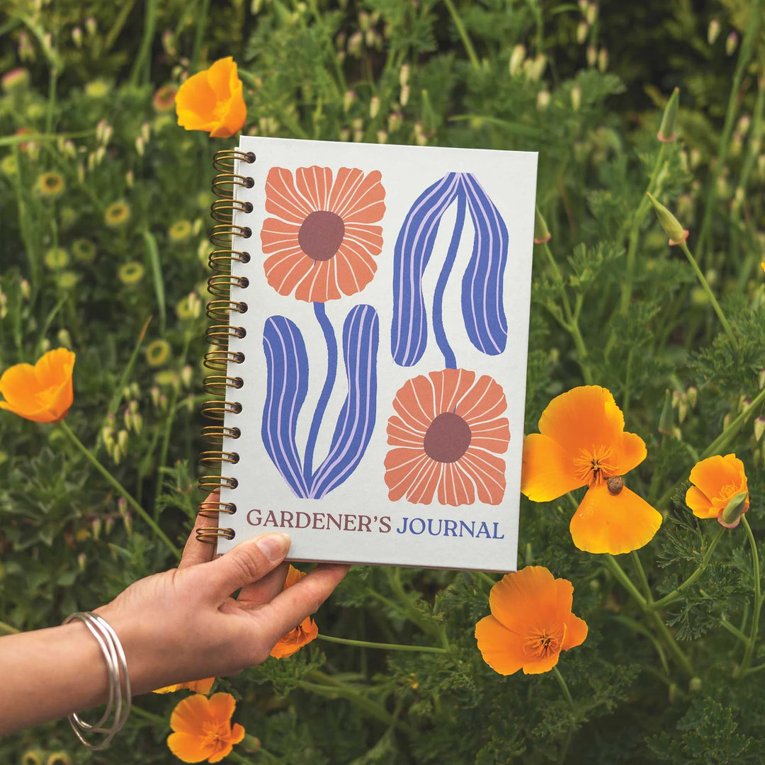 A5 Gardening Hardcover Journal by Good Tuesday featuring a botanical bloom design, ideal for garden planning and notes.