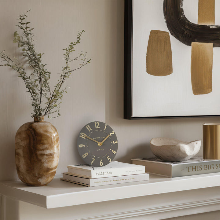 Art Marketing Mulberry mantel clock in espresso finish, showcasing a vintage-inspired design with a round face and decorative details.