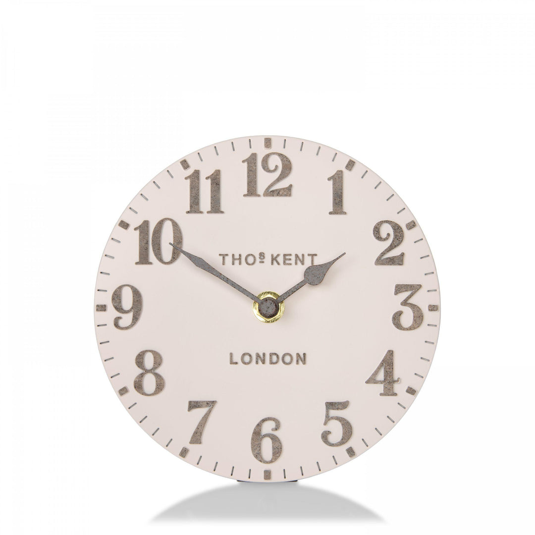 Pink Arabic mantel clock by Cornucopia Home and Gift, featuring a shy pink design and intricate art marketing style.