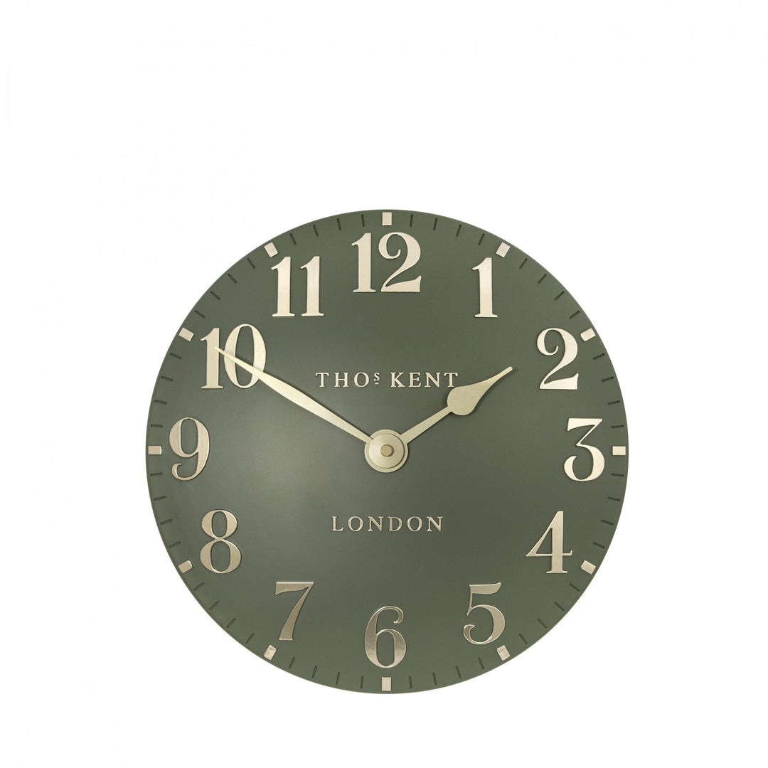 Lichen green 12-foot Arabic wall clock by Cornucopia Home and Gift, featuring bold Arabic numerals and a modern art design.