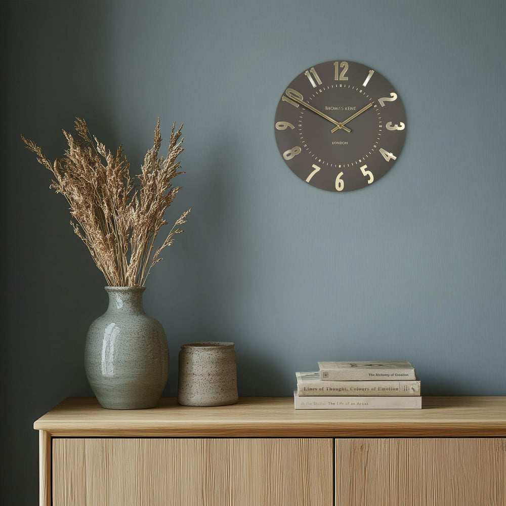 12-foot Mulberry wall clock by Cornucopia Home and Gift, in espresso finish, featuring a large round art marketing design.