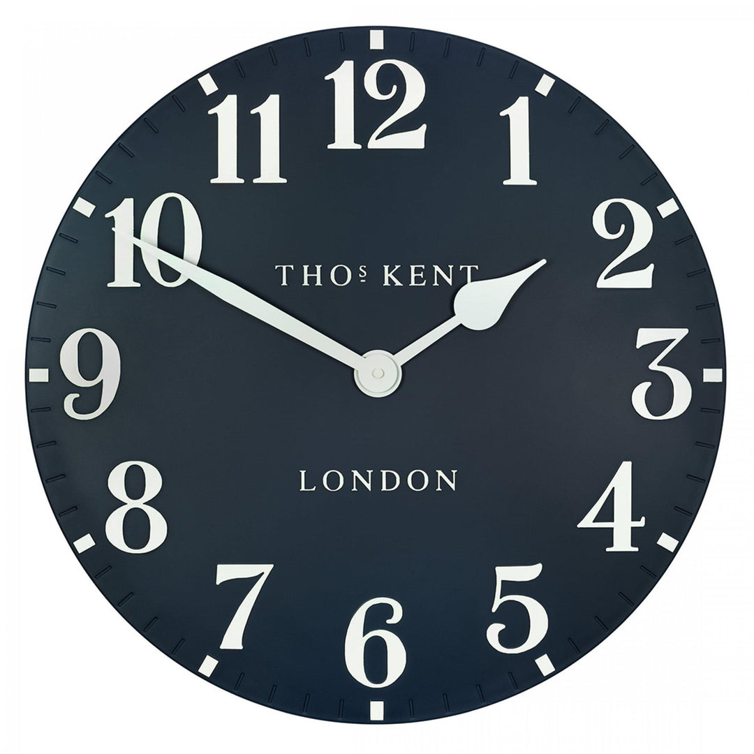 Large 20-inch Arabic ink wall clock with bold black numerals and artistic design, ideal for home decor by Cornucopia Home and Gift.