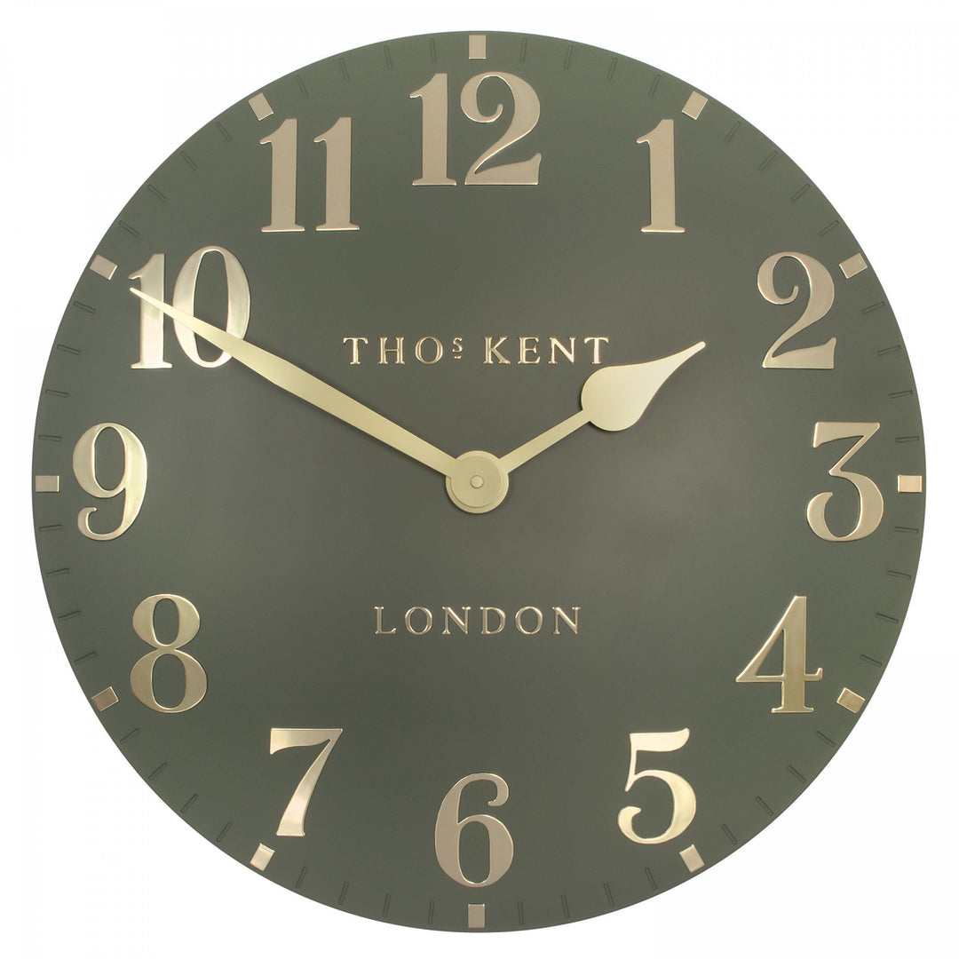 20-inch Arabic Lichen Green wall clock by Cornucopia Home and Gift, featuring a modern design with Arabic numerals.