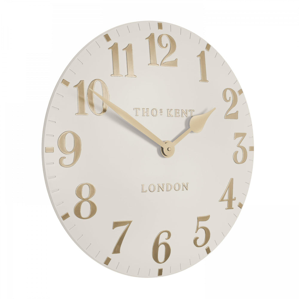20-inch Arabic wall clock in oatmeal color with black numerals, designed by Cornucopia Home and Gift, perfect for modern home decor.