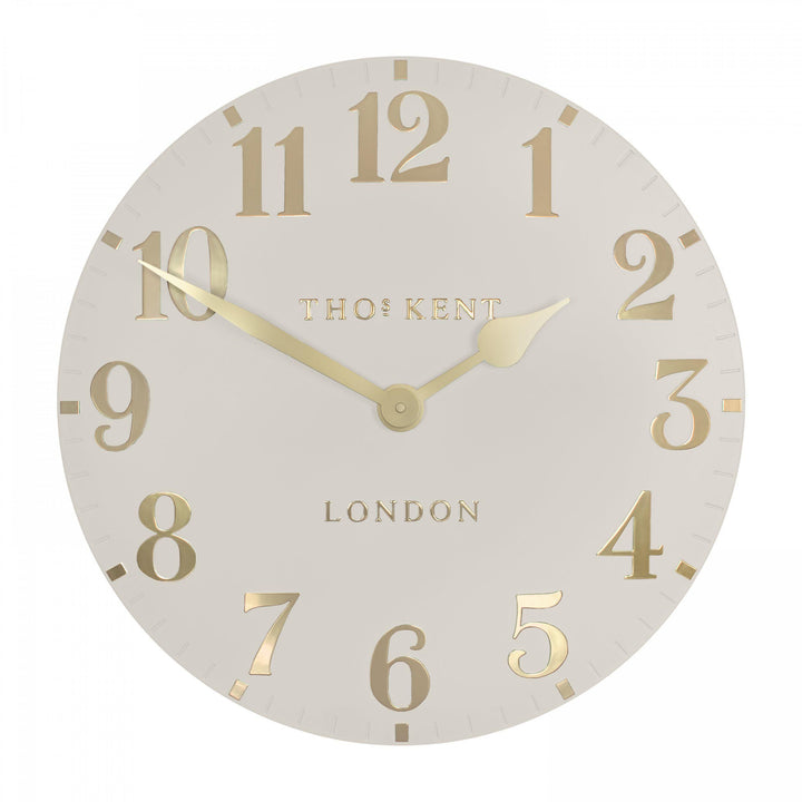 20-inch Arabic wall clock in oatmeal color, featuring bold numerals, by Cornucopia Home and Gift for stylish home decor.
