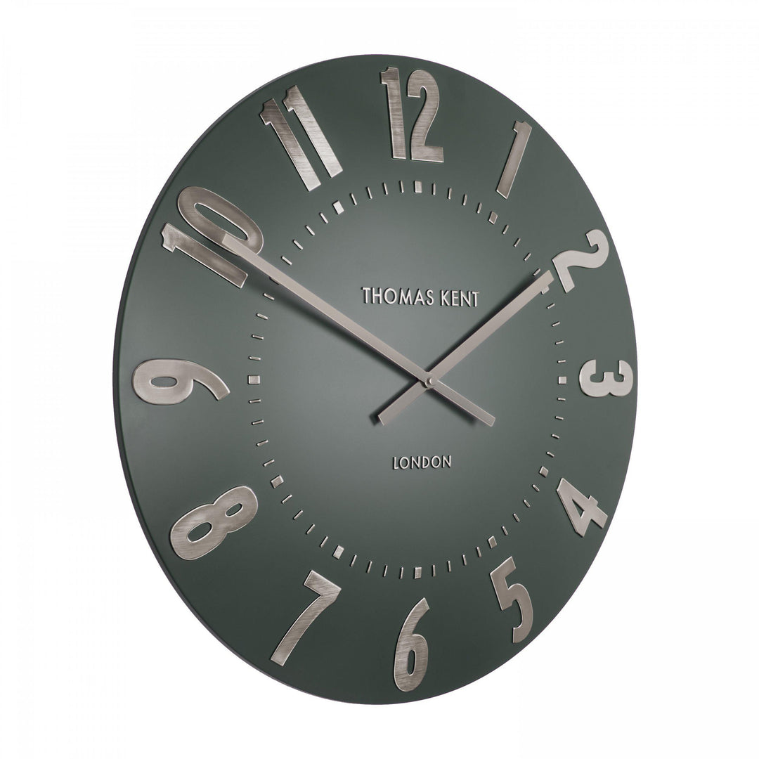 20-inch olive green Arabic wall clock by Cornucopia Home and Gift featuring bold black numerals and modern design.