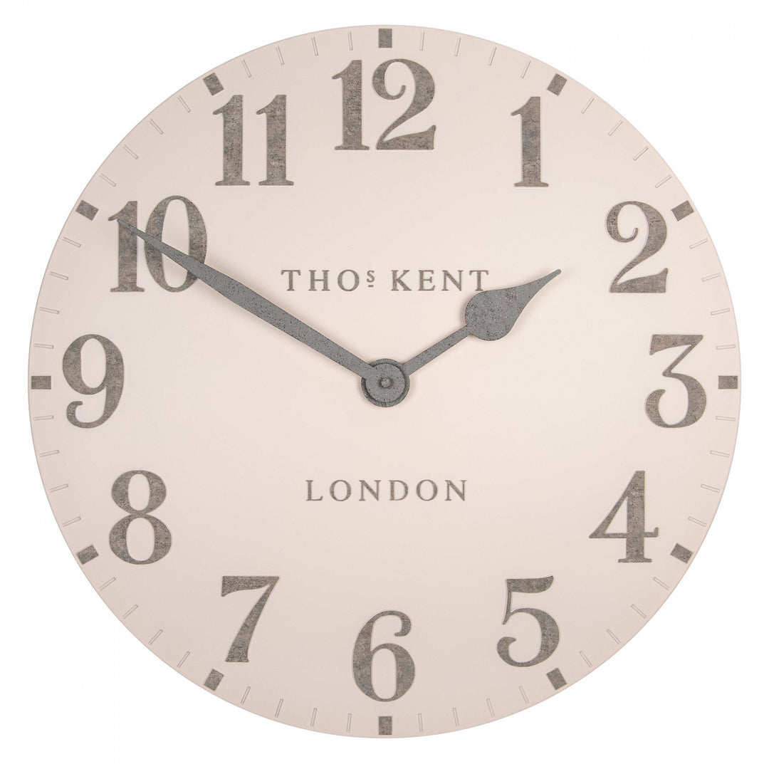 20-foot Arabic wall clock in shy pink by Cornucopia Home and Gift, featuring bold Arabic numerals and a modern decorative design.