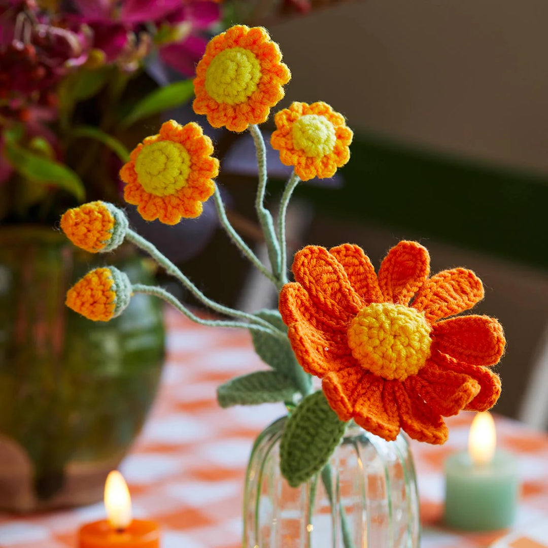 Hand-crocheted autumn stems by Cornucopia Home and Gift, featuring colorful, textured crochet leaves and berries for fall decor.