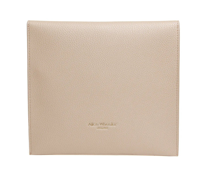 Alice Wheeler travel mirror and case in stone color, compact design with reflective surface and protective exterior.