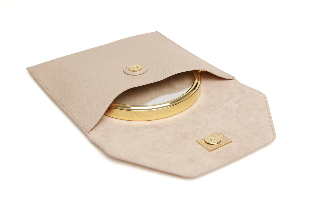 Open Alice Wheeler travel mirror with stone case, compact and stylish for on-the-go beauty touch-ups.