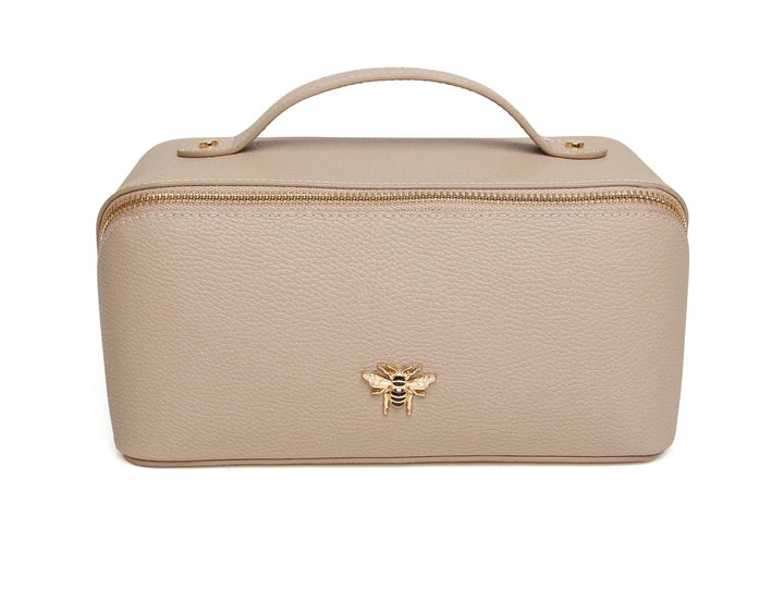 Alice Wheeler Stone Mini Train Case showing compact, stylish luggage with a stone pattern and secure zipper closure.