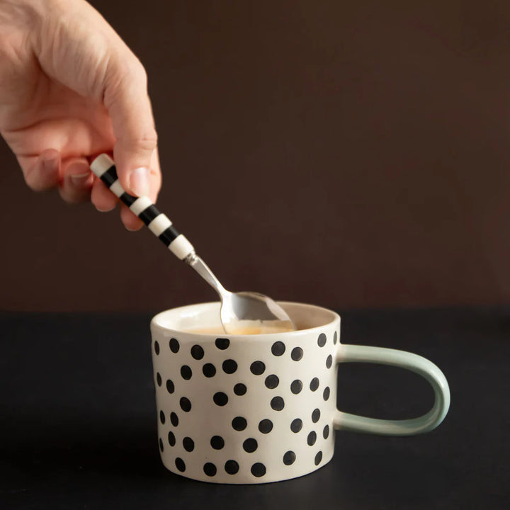 Caroline Gardner Mono Ditsy Spot Mug featuring a white background with small black ditsy spots, perfect for gift-giving.