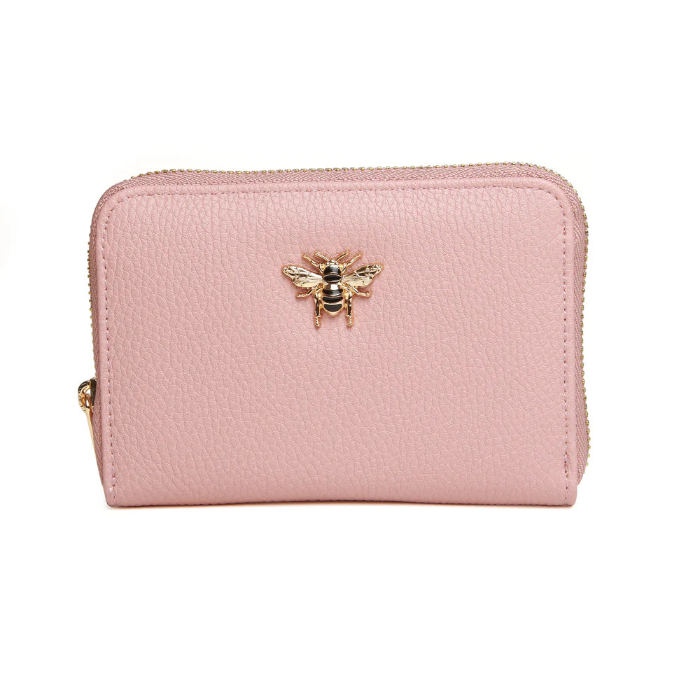 Pink Alice Wheeler Bromley Purse with gold hardware and multiple card slots, stylish and compact accessory.