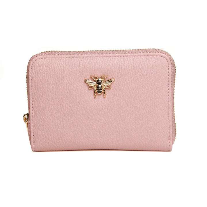 Pink Alice Wheeler Bromley Purse with gold hardware and multiple card slots, stylish and compact accessory.