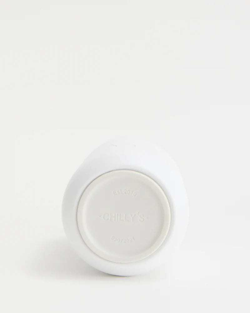 Series 2 Arctic White Chillys water bottle from Cornucopia Home and Gift, sleek white stainless steel with a secure lid.