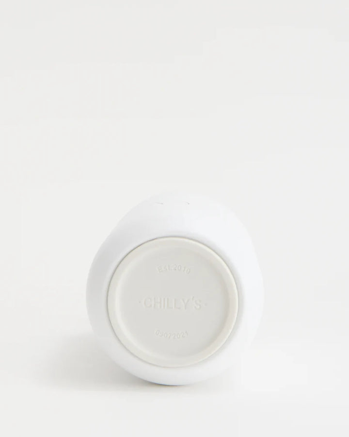 Series 2 Arctic White Chillys water bottle from Cornucopia Home and Gift, sleek white stainless steel with a secure lid.