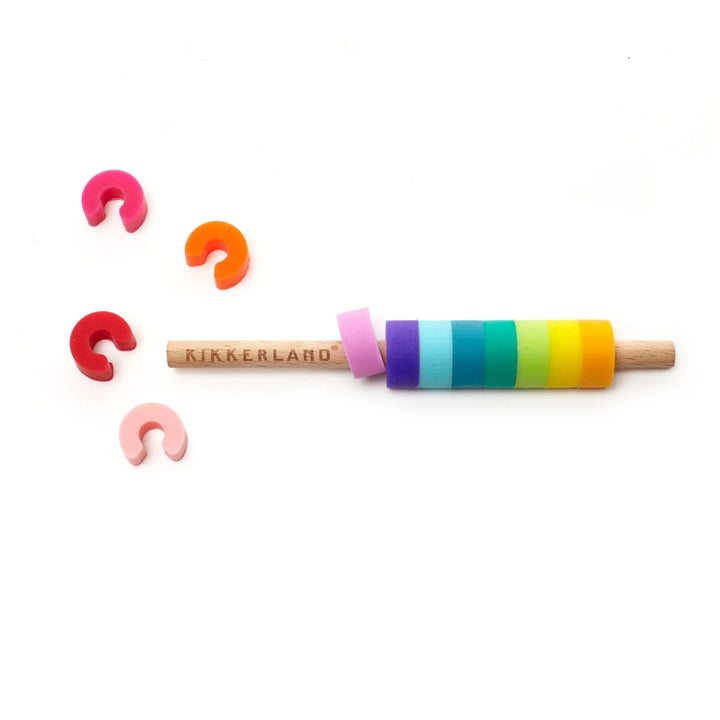 Colorful Rainbow Drink Markers by Kikkerland for identifying glasses, featuring vibrant rainbow designs for wine and beverage glasses.