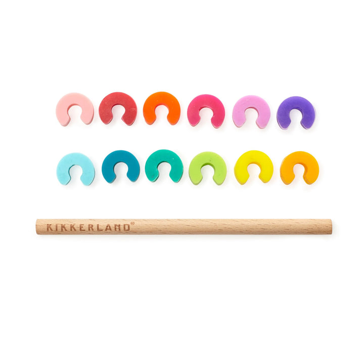 Rainbow Drink Markers by Kikkerland, colorful wine markers with rainbow design for easy drink identification.