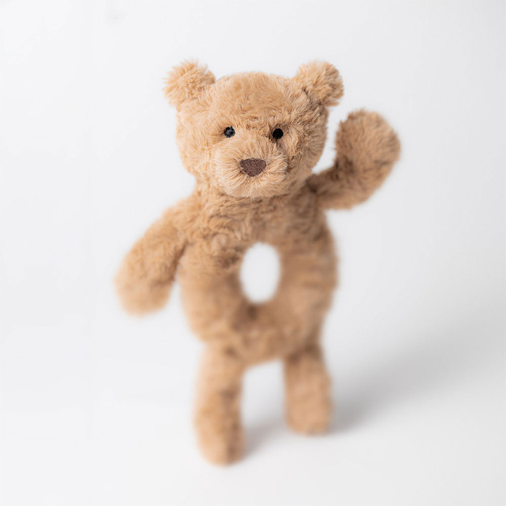 Soft Jellycat Bartholomew Bear ring rattle with plush fabric and gentle features for infants, designed for comfort and sensory play.