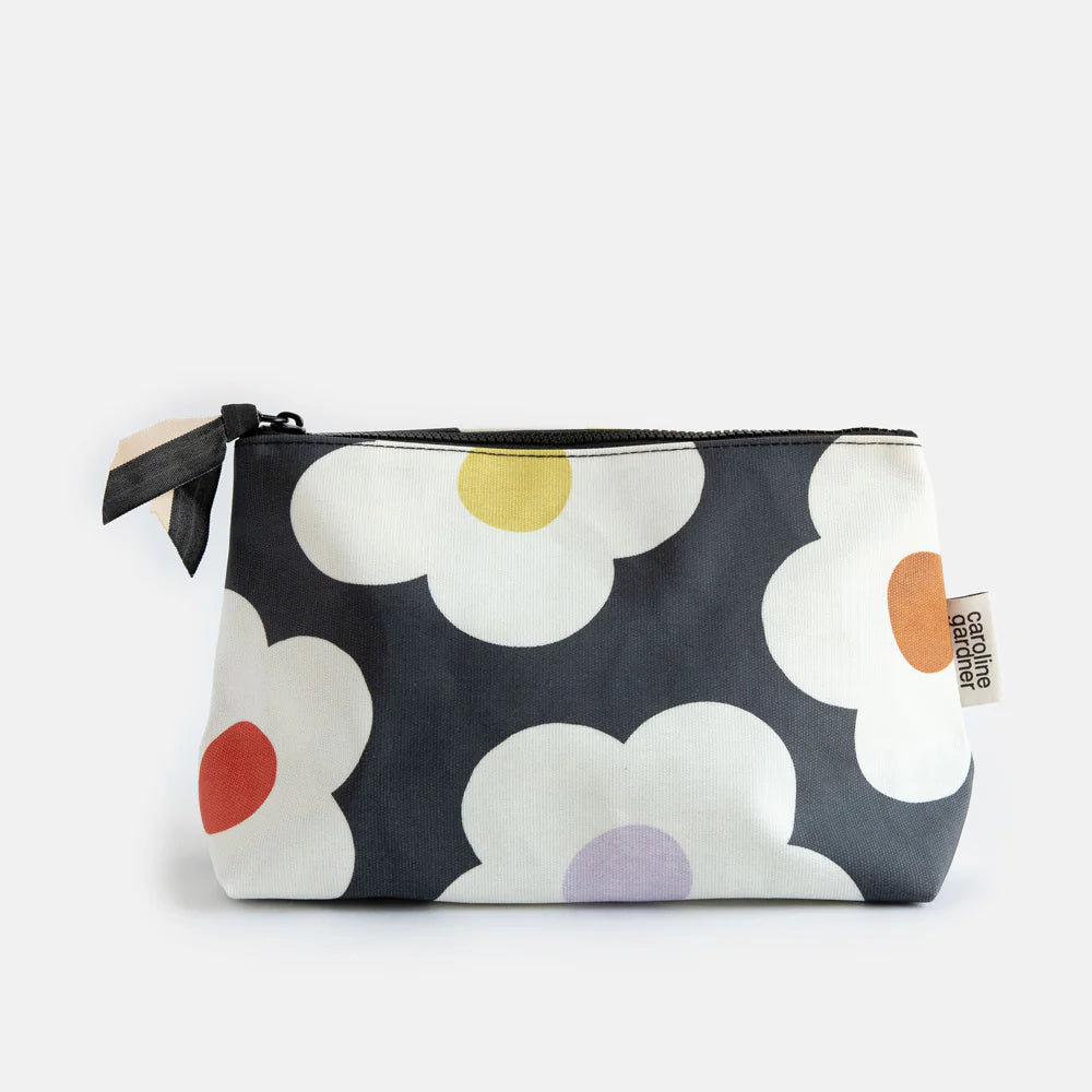 Caroline Gardner multi-flower charcoal coated canvas beauty bag with floral design, ideal for gift or travel storage.
