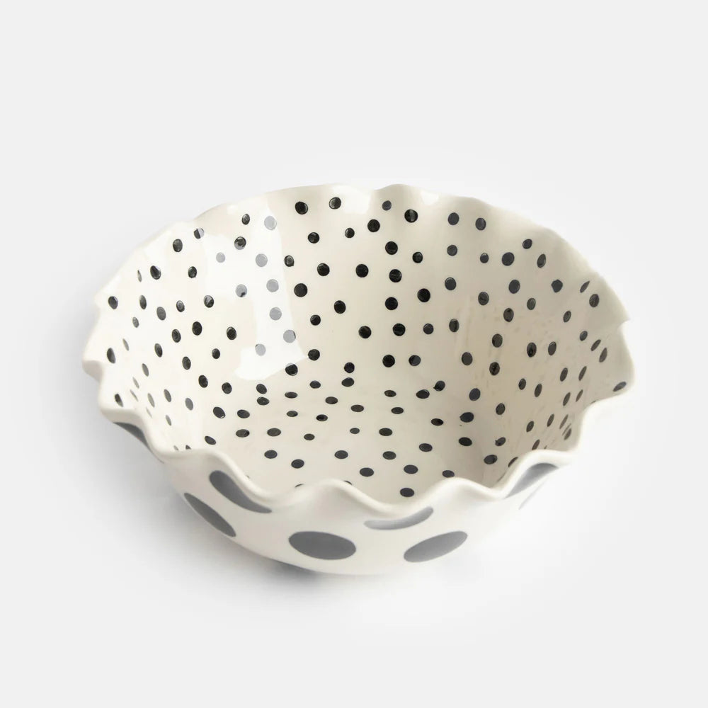 Large Caroline Gardner Mono Dots Frilly Bowl from Cornucopia Home and Gift, featuring bold dot patterns and a ruffled edge.