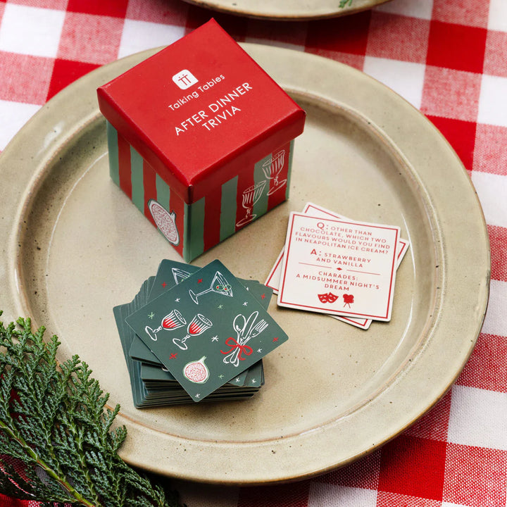 Talking Tables Bon Noel Trivia Box with 60 Christmas-themed cards, perfect for holiday fun and festive gatherings.