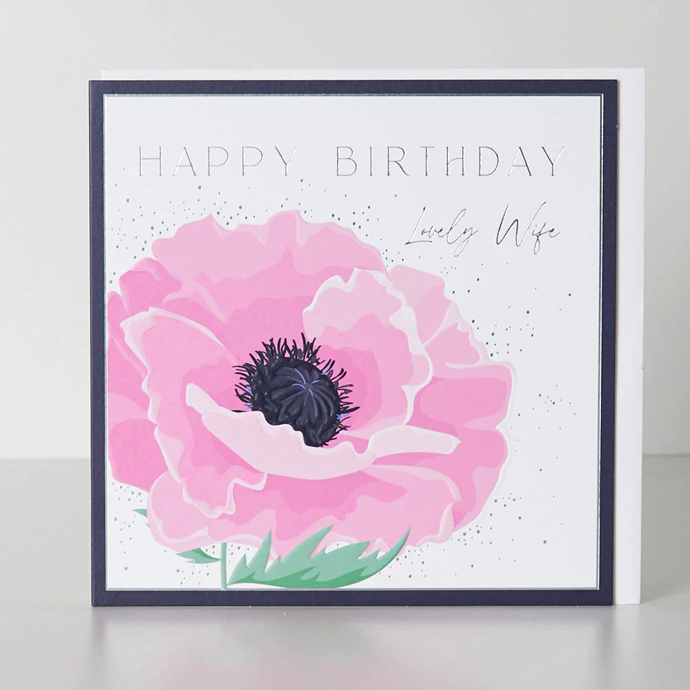 Belly button-shaped birthday card for wife with poppy design by Cornucopia Home and Gift, featuring colorful floral artwork.