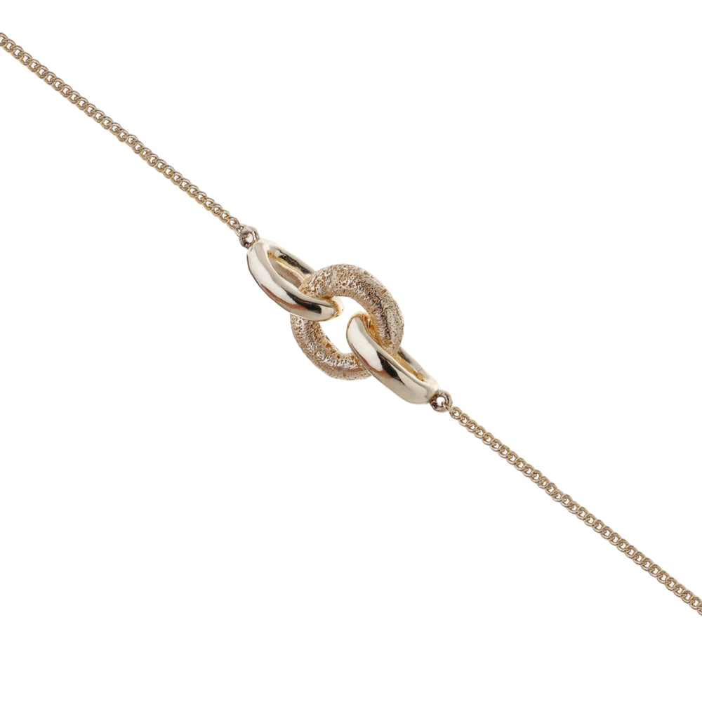 Tutti & Co Bind Bracelet featuring woven design with natural and earthy tones, styled with casual jewelry accessories.