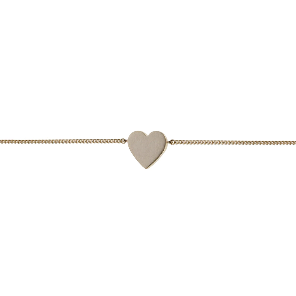 Gold Spirit bracelet by Tutti & Co featuring a delicate, minimalist design, displayed on a neutral background.