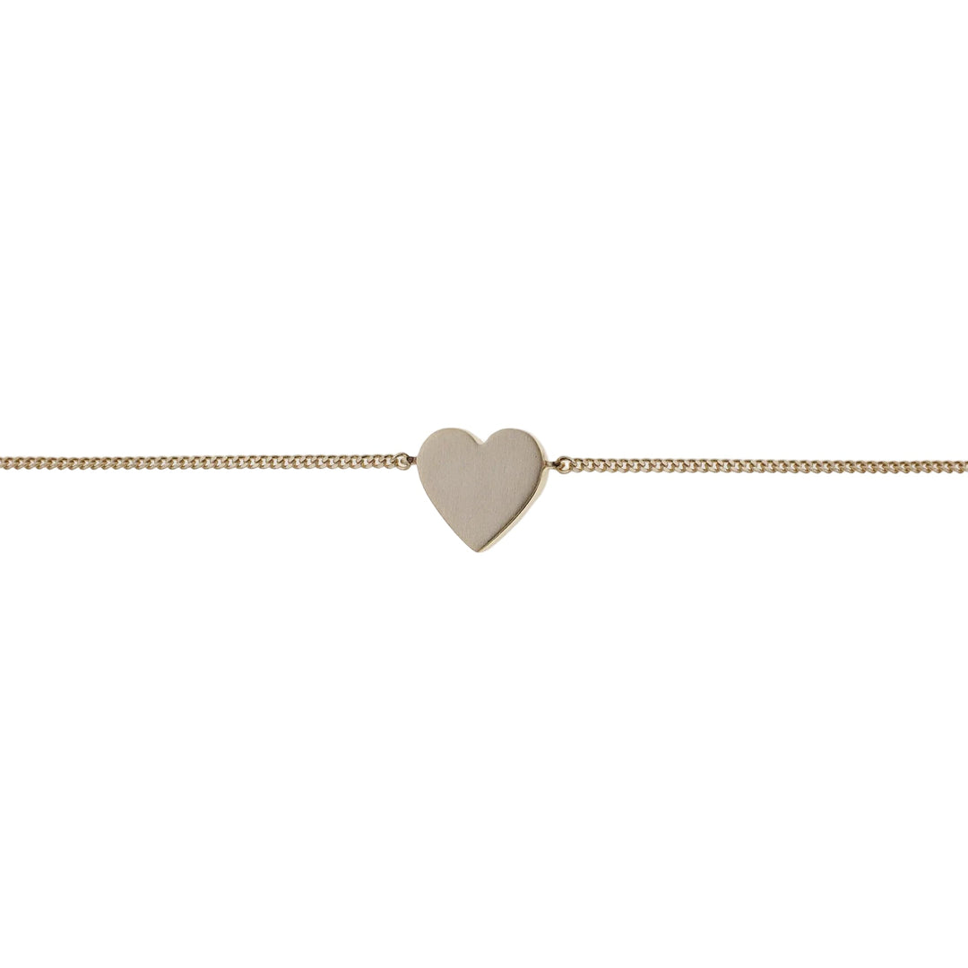 Gold Spirit bracelet by Tutti &amp; Co featuring a delicate, minimalist design, displayed on a neutral background.